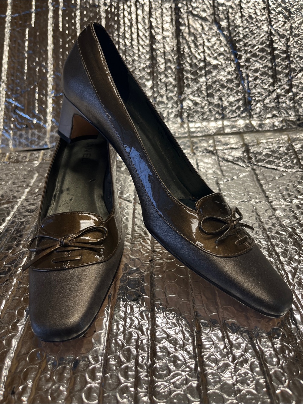 Classic Women's Black Low Block Heel Pumps with Bow peeling inside